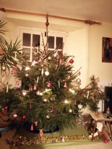 Our Christmas tree for 2020, and is that possibly some tasty home grown food i spy on the table next to it?